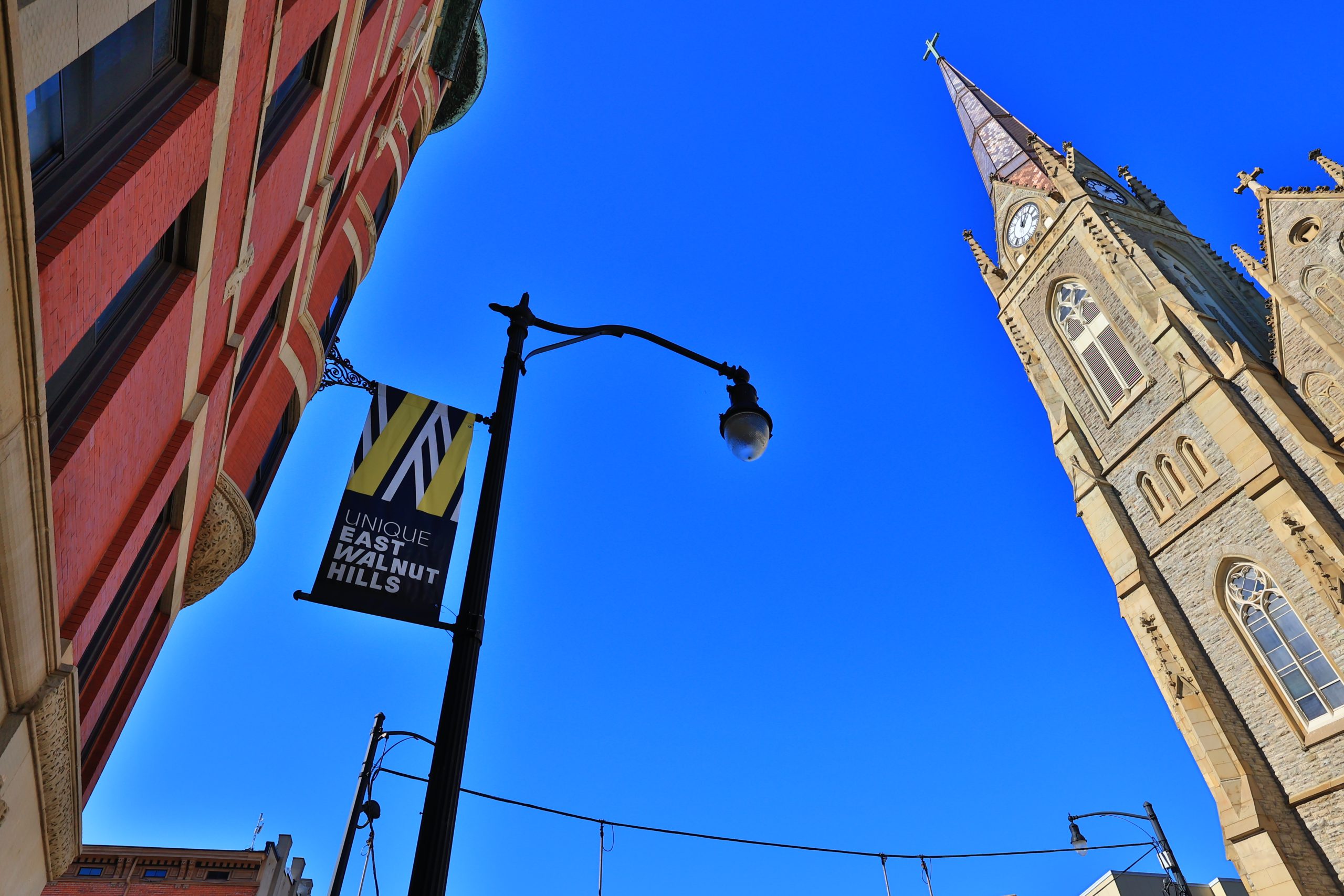 Street view in East Walnut Hills, Cincinnati, a neighborhood known for its historic architecture and vibrant local identity.